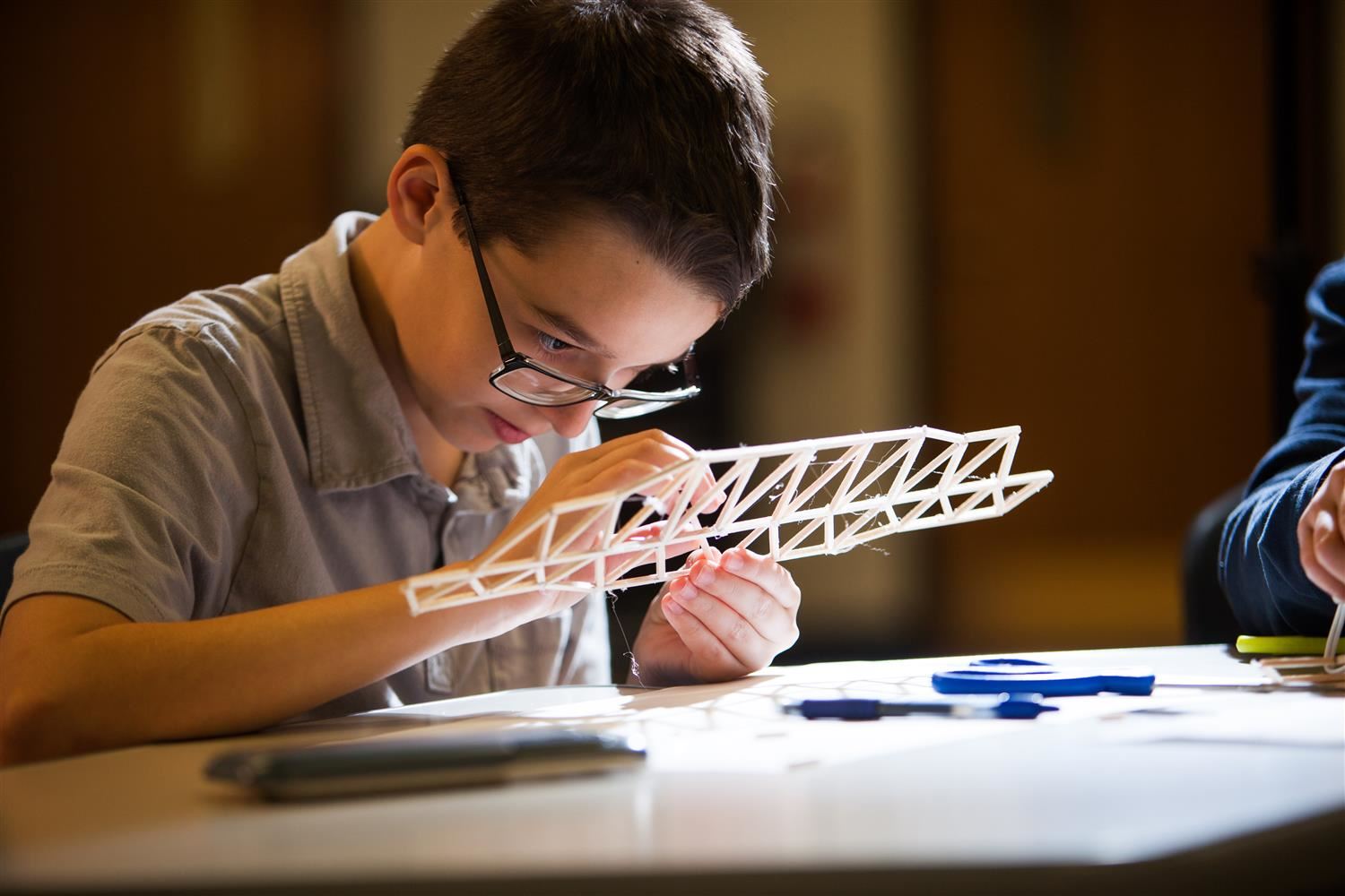Student working on bridge Student working on bridge